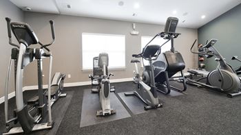the gym is equipped with state of the art equipment including cardio machines and weights